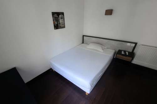 Bright double room with simple decor